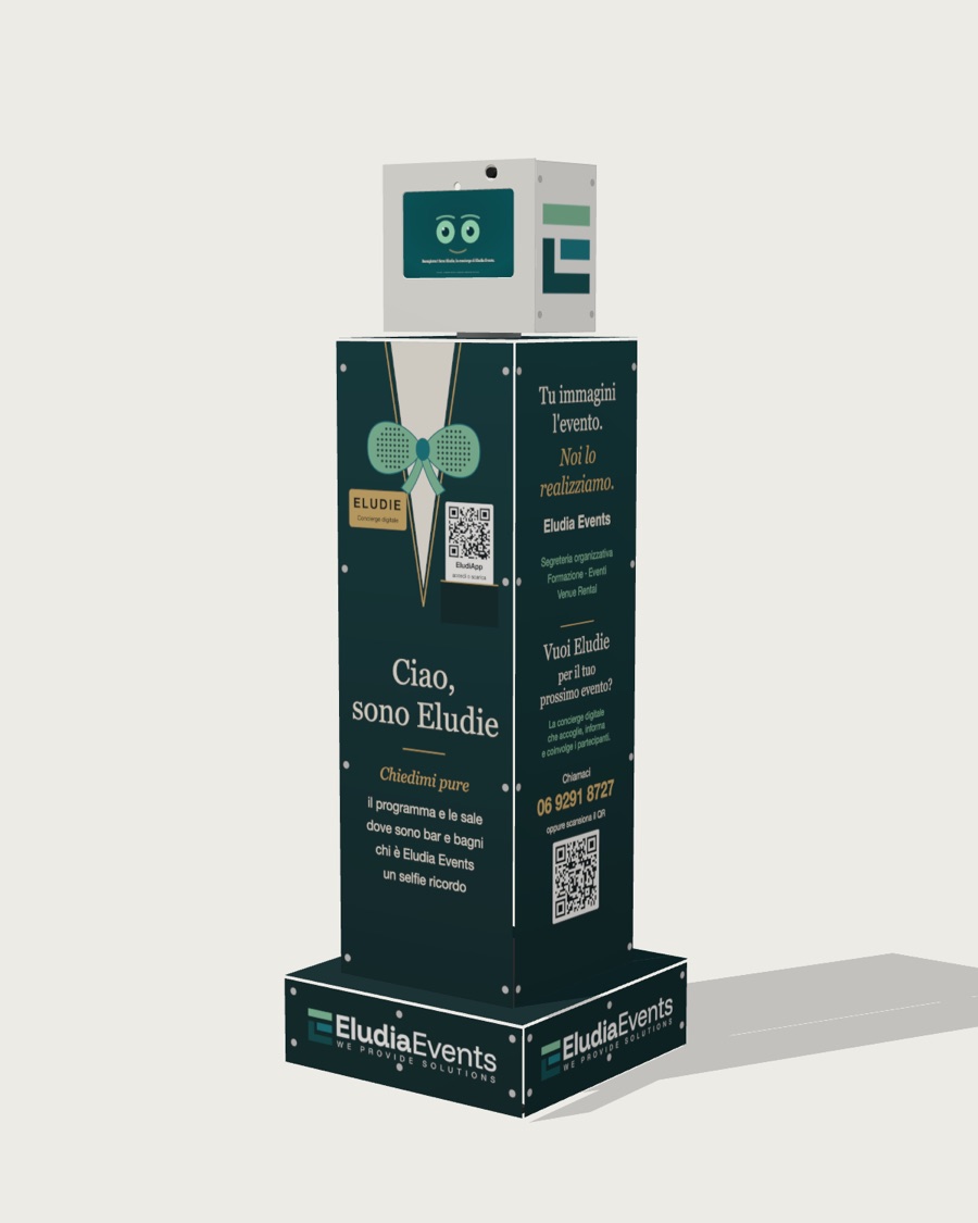 Eludie, la concierge digitale di Eludia Events: un totem con lo schermo-viso in alto e i pannelli verdi con il papillon